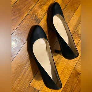 Size 7B black Cole Haan 3 inch high heels with round toe and slight platform.